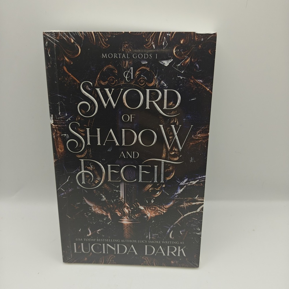 A Sword of Shadow and Deceit (Mortal Gods Book 1) by Lucinda Dark New Sealed